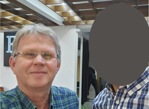 Colin Macpherson with a Central Asian Scholar. 